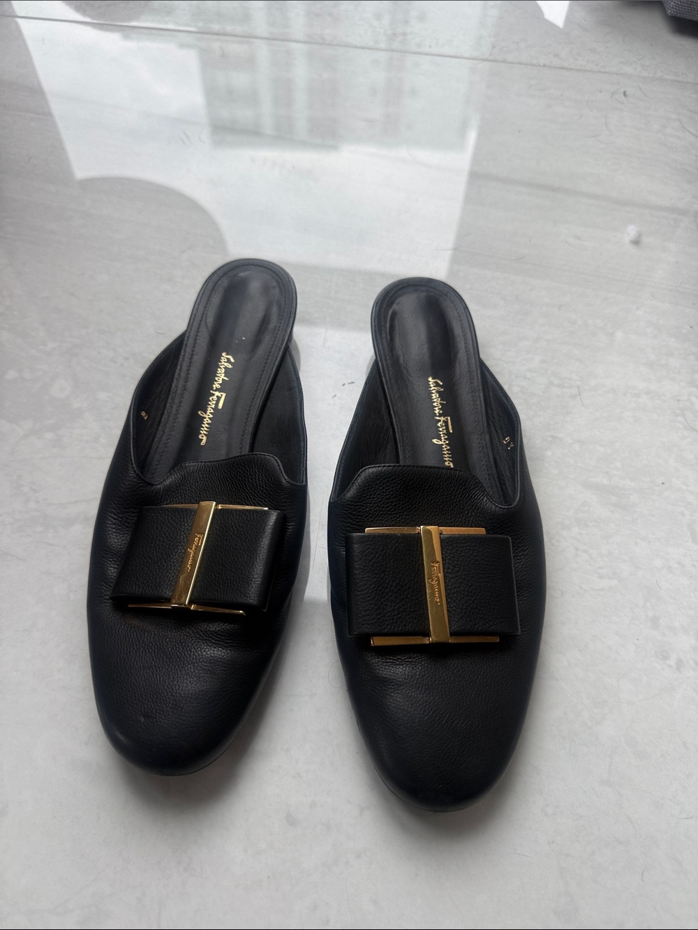 Salvatore Ferragamo Black Leather Vara-Inspired Bow Mules with Gold Accent